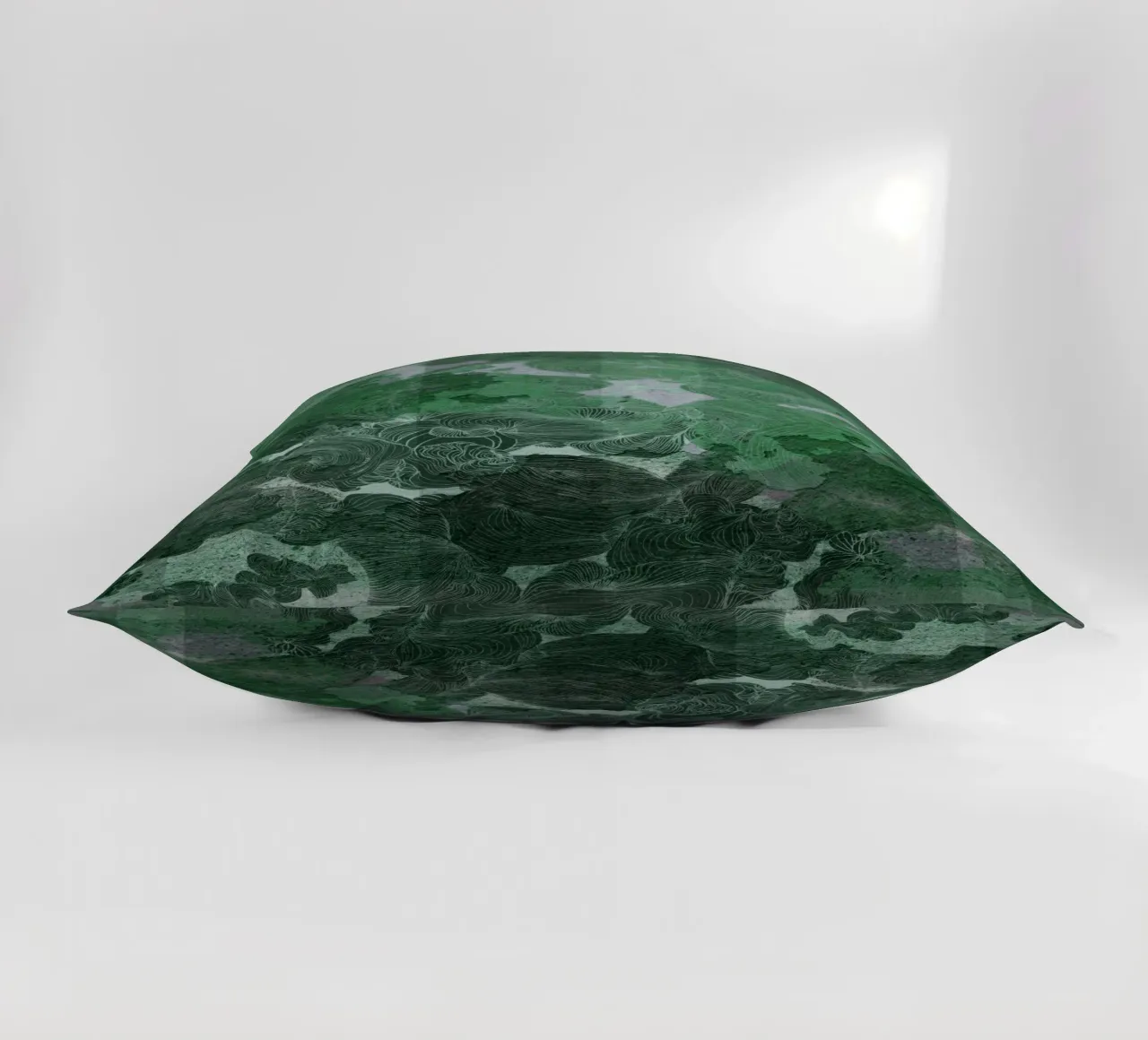 green decorative cushion by Giulio Iurissevich