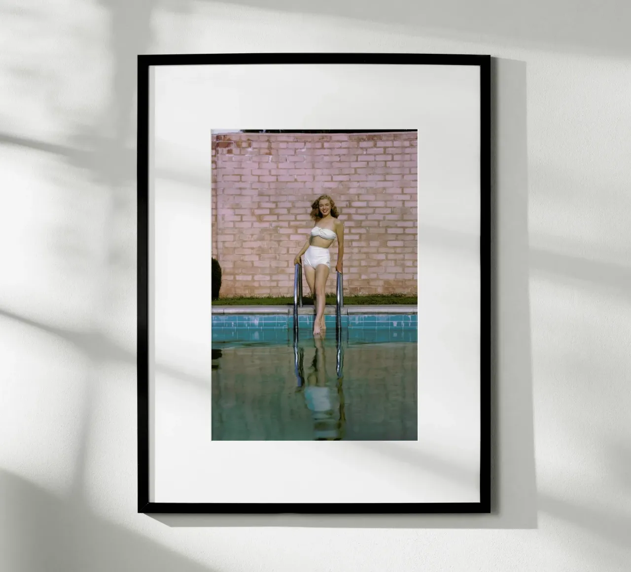 Young Marilyn Monroe Poolside I poster by Gallery Print and Art Limited