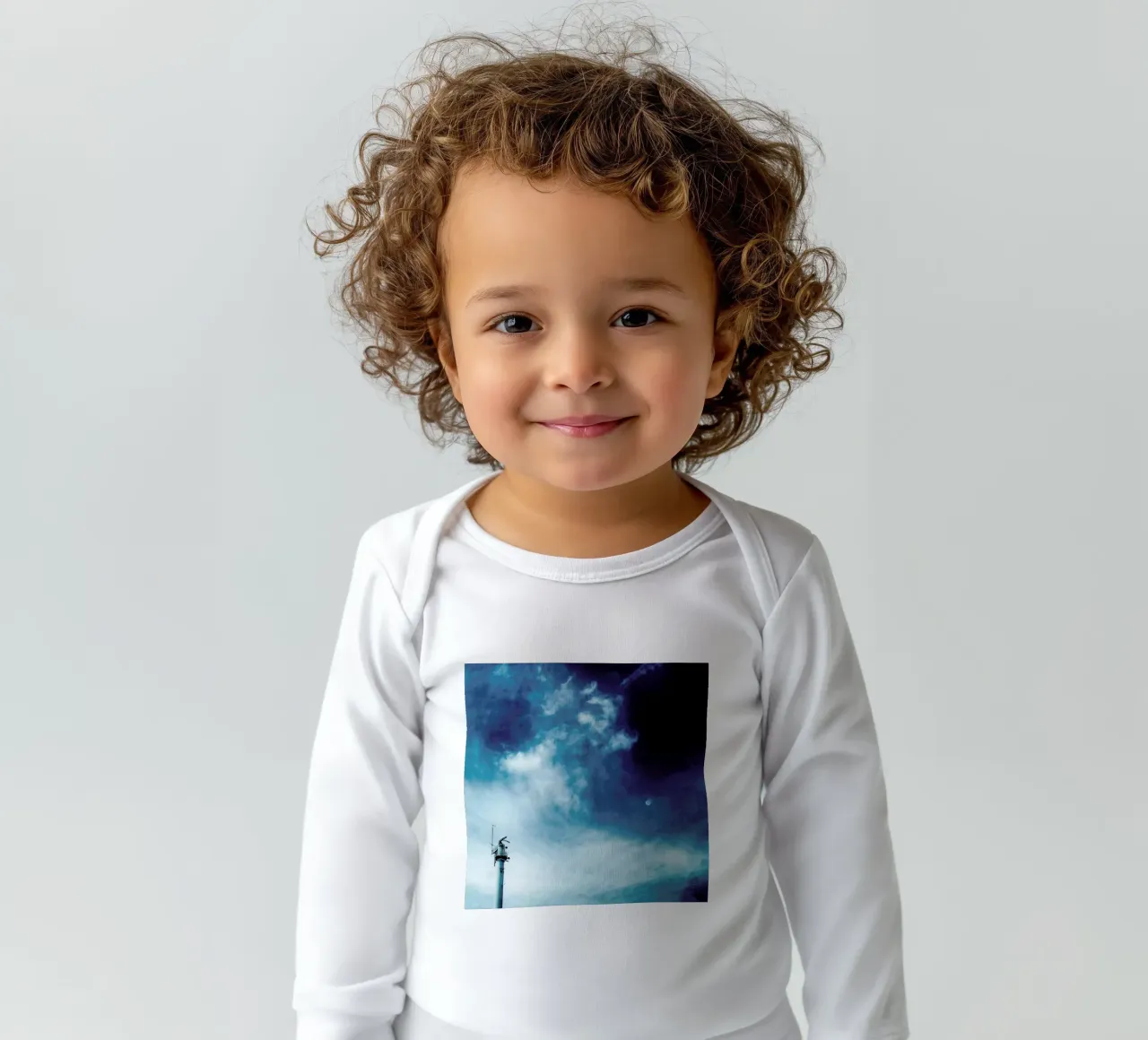 Weatherstation long-sleeve baby romper by Sattrup & Høst