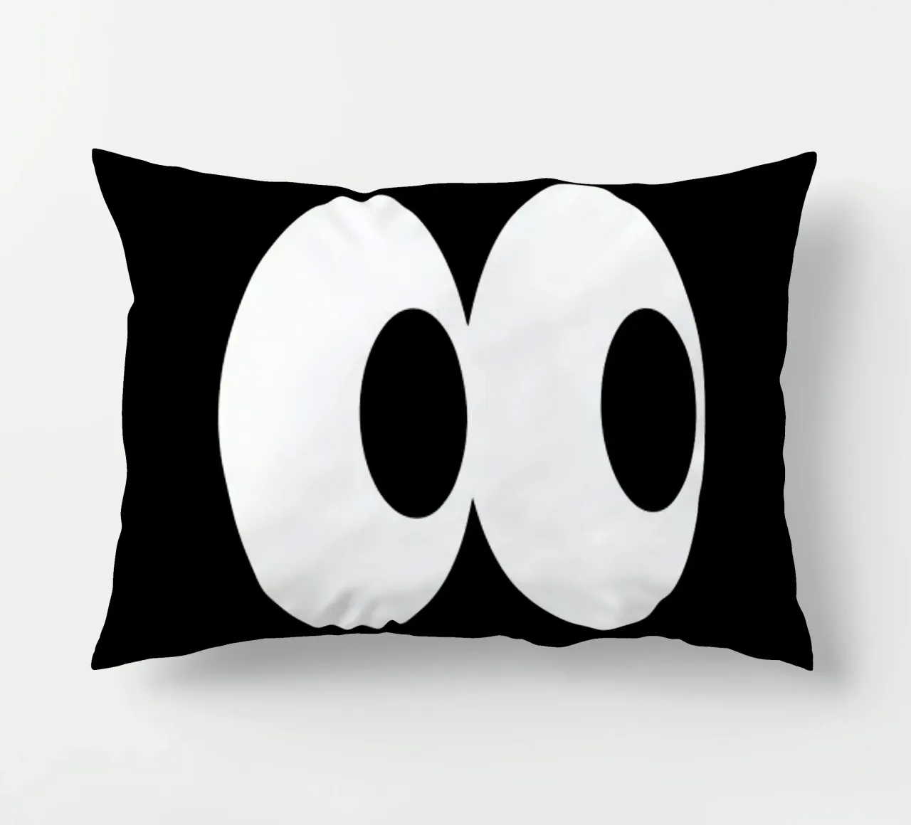 Black Eyes decorative cushion by The Poster Kid