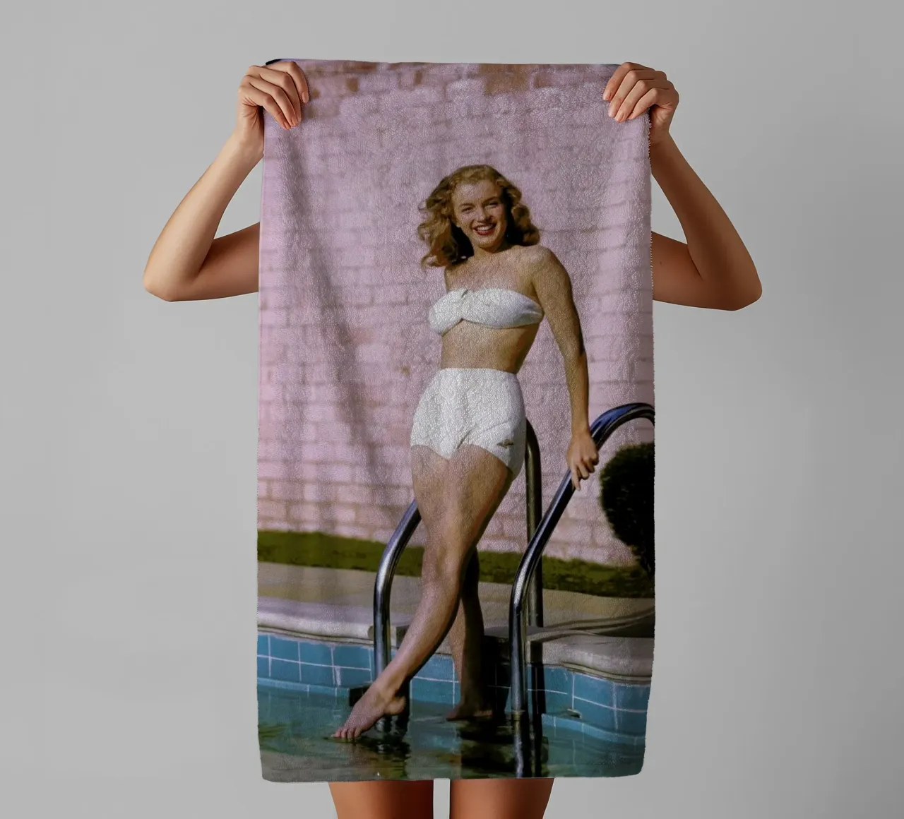 Young Marilyn Monroe Poolside II towel by Gallery Print and Art Limited