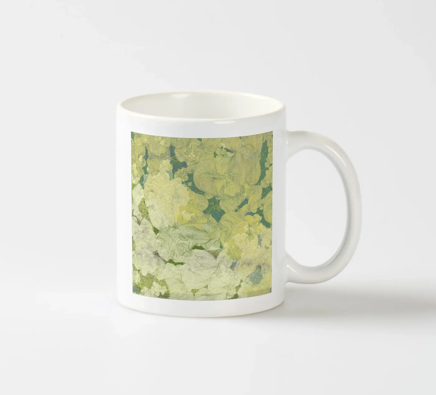 yellow ceramic mug by Giulio Iurissevich