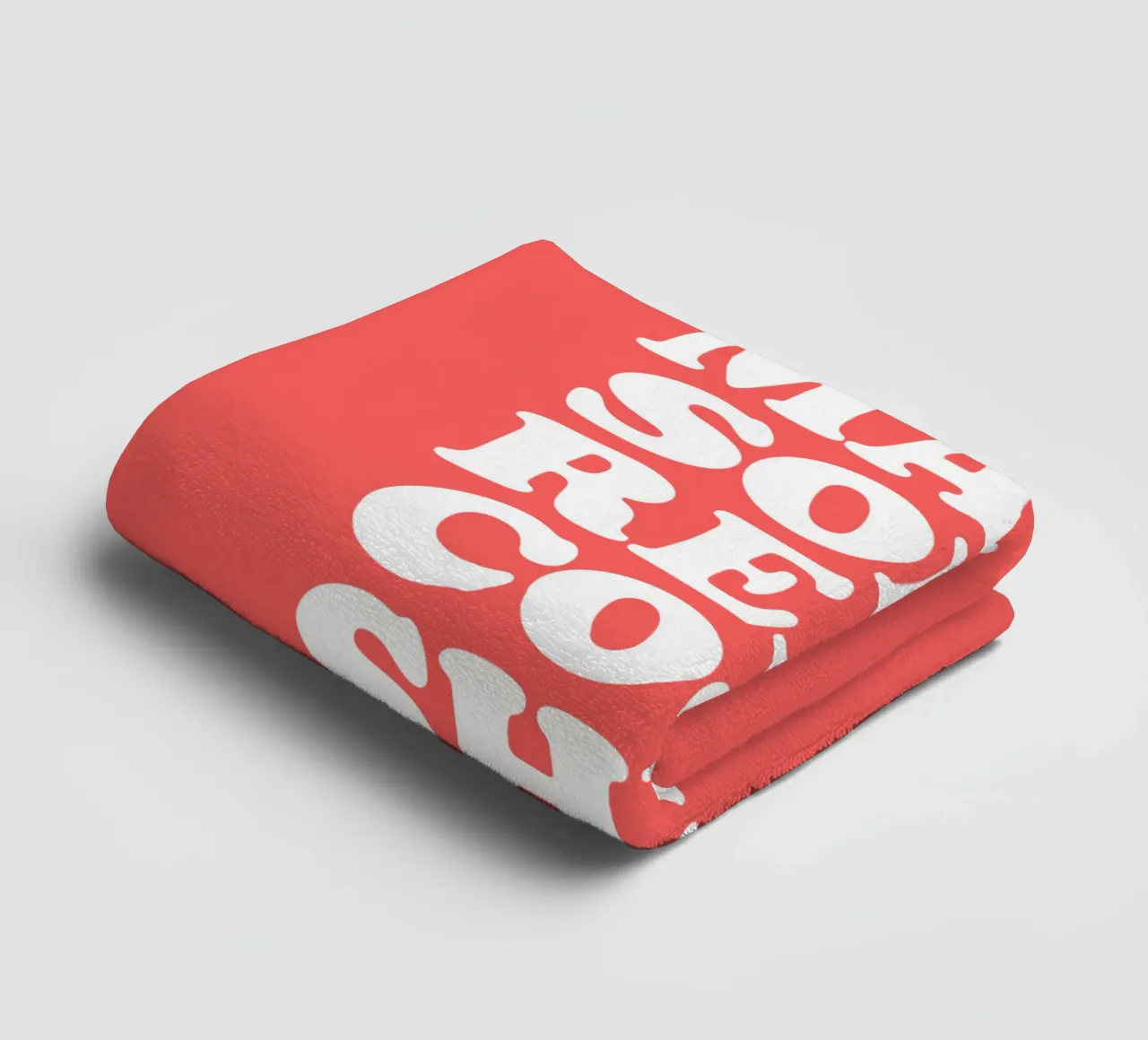 Realizzare un design tipografico retrò in grassetto in rosso asciugamano da bagno da THE MOTIVATED TYPE