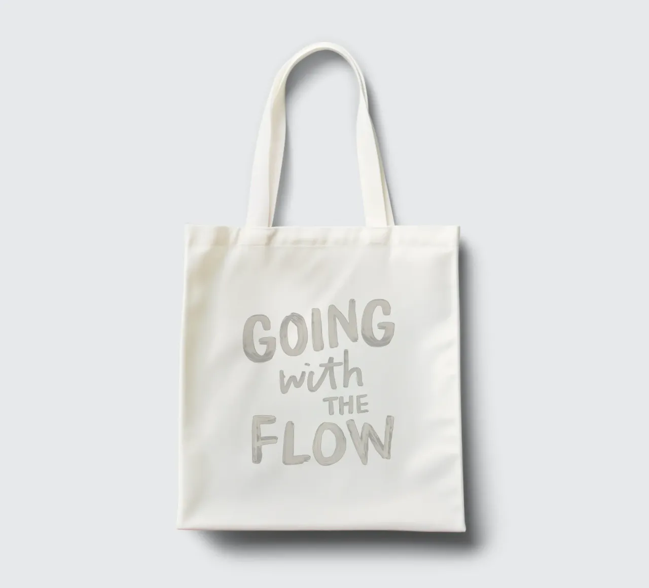 Going with the Flow, design tipografico dipinto a mano in blu borsa in juta da THE MOTIVATED TYPE