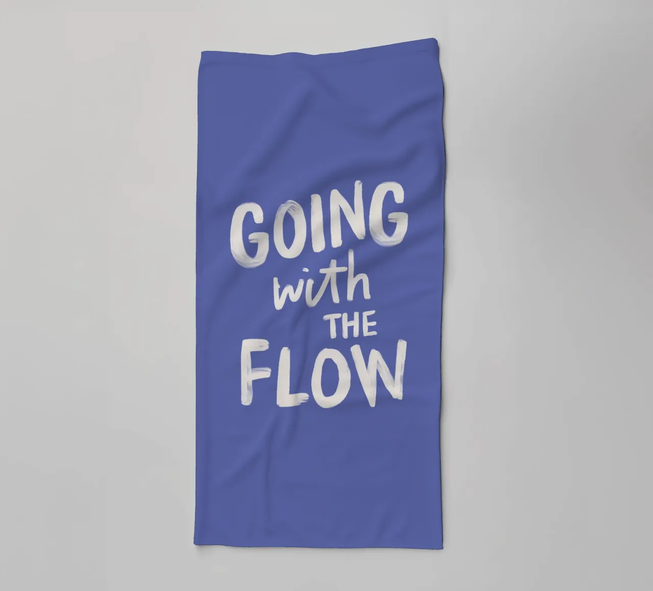Going with the Flow, design tipografico dipinto a mano in blu asciugamano da bagno da THE MOTIVATED TYPE