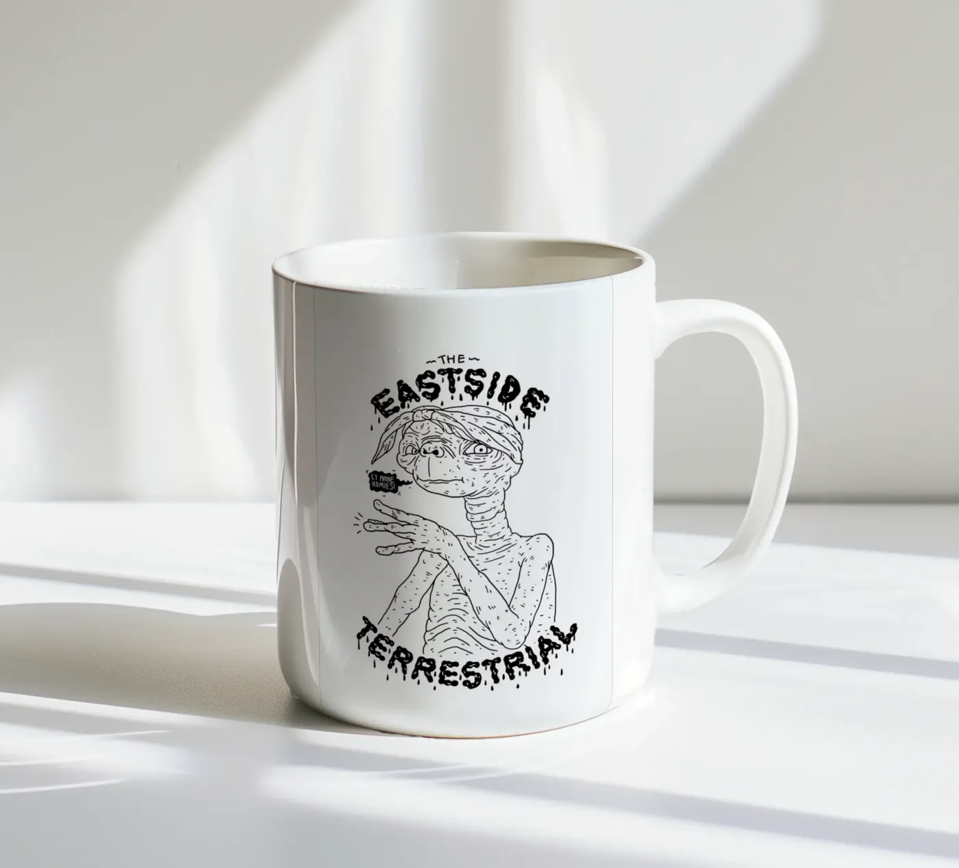 E.T. ceramic mug by Nick Cocozza