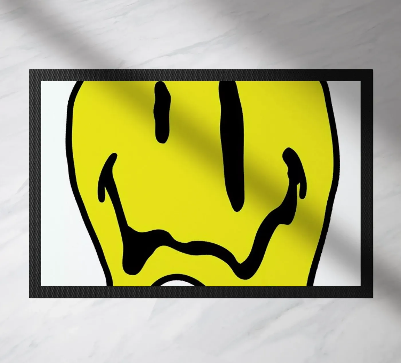 Smiley paillasson de Nick Cocozza