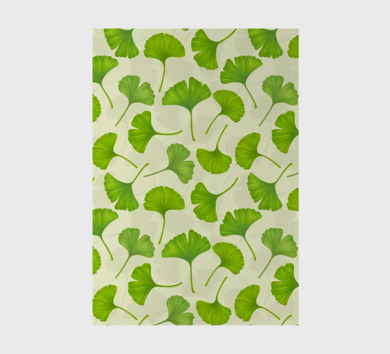 Ginkgo leaves on off white notebook by Painted Nature