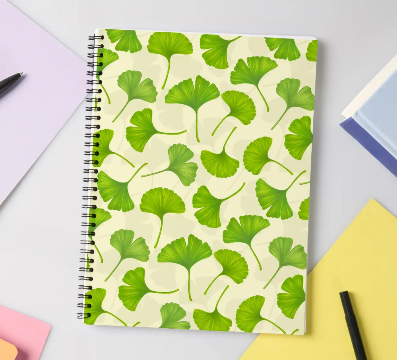Ginkgo leaves on off white spiral notebook by Painted Nature