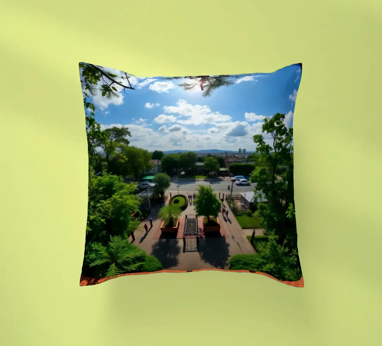una giornata di sole in un parco verde con sentieri e lo skyline della città cuscino da DesignDoodle