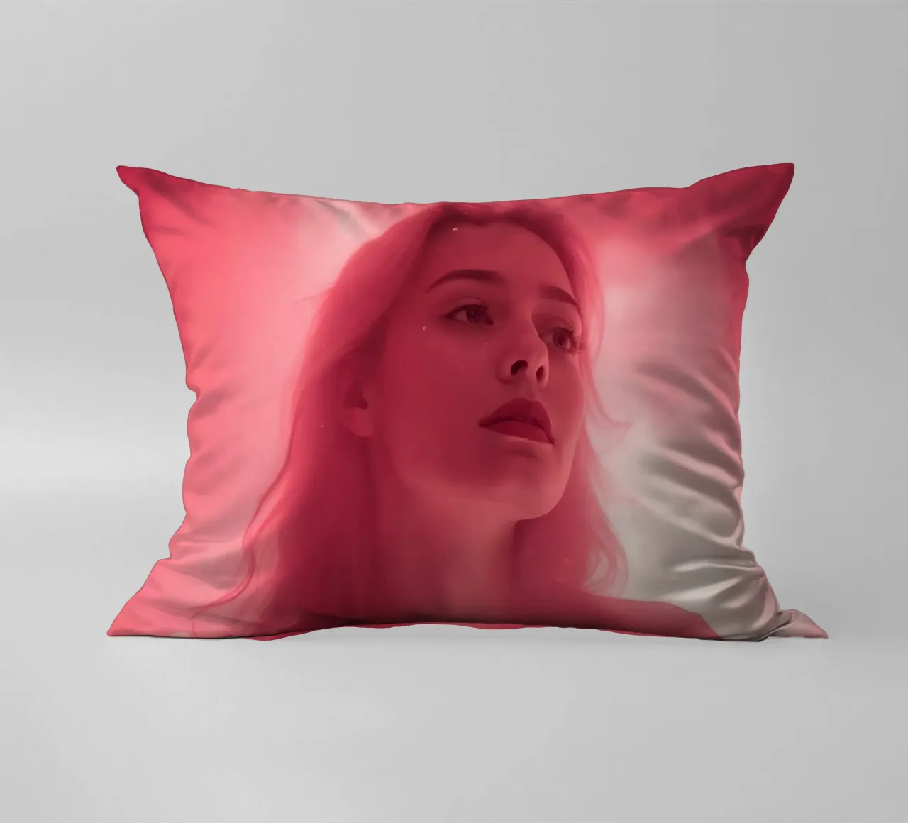Soft pink light envelops a woman with long hair decorative cushion by DesignDoodle