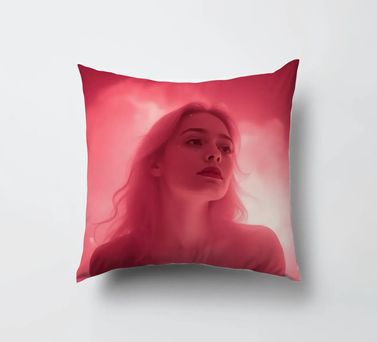 Soft pink light envelops a woman with long hair decorative cushion by DesignDoodle