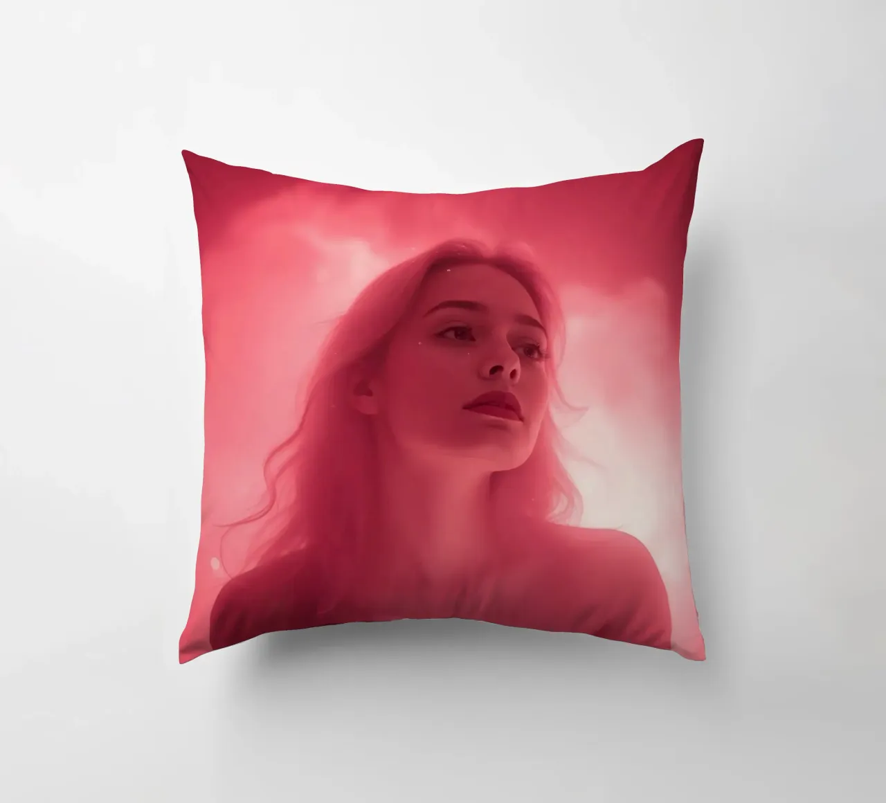 Soft pink light envelops a woman with long hair decorative cushion by DesignDoodle