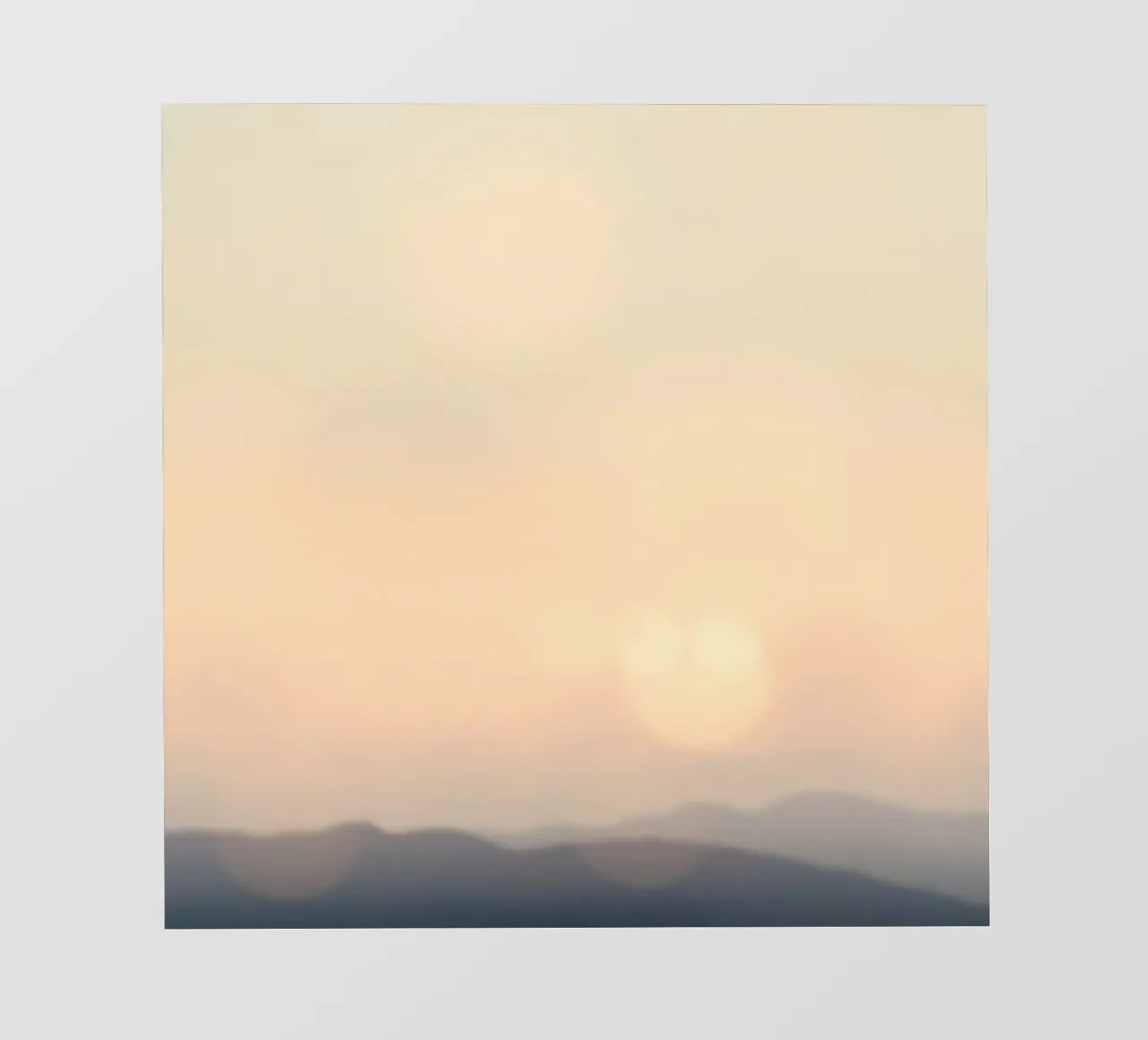 Sunset casting a warm glow over distant mountains and cloude pvc cover by DesignDoodle