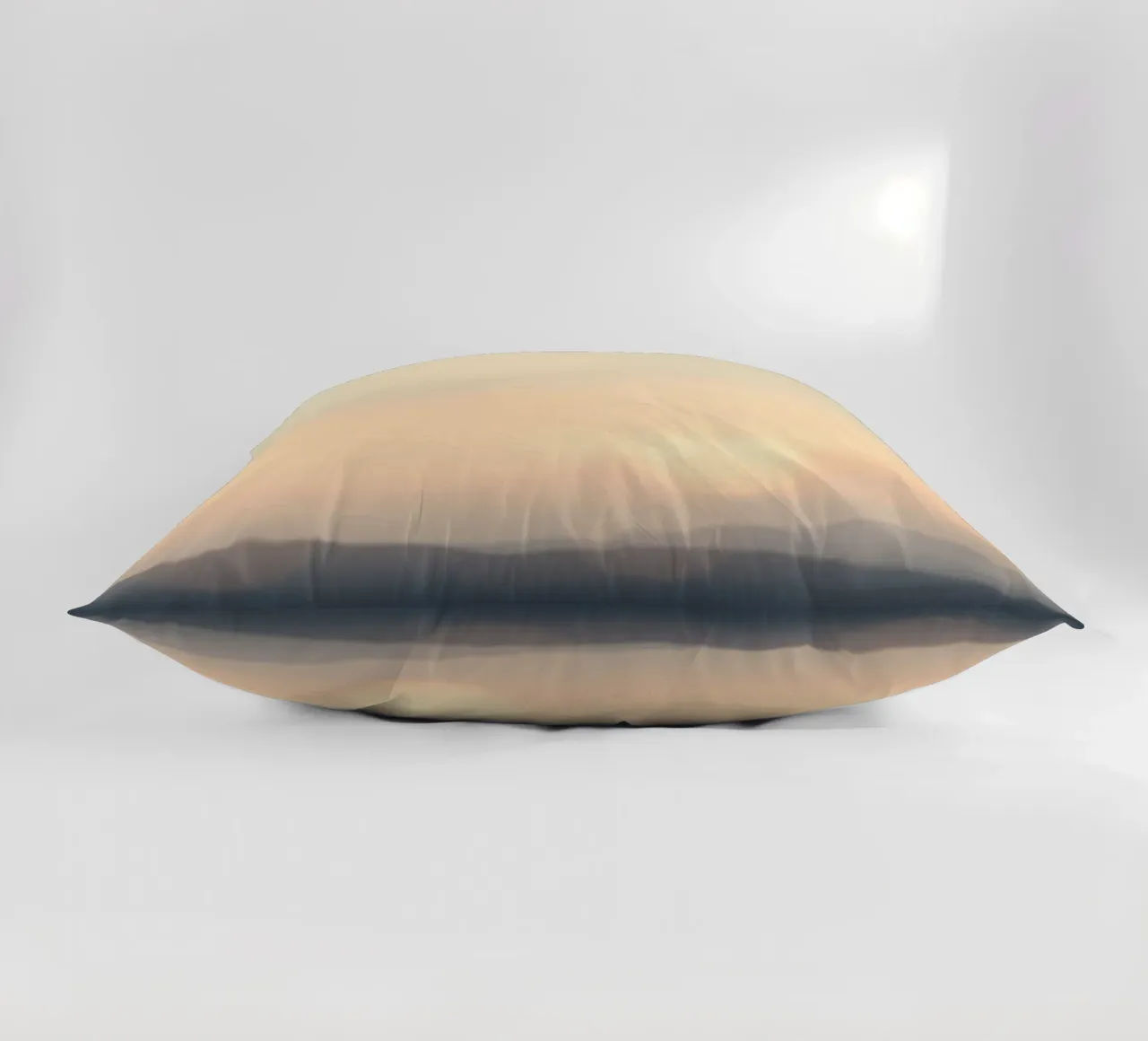 Sunset casting a warm glow over distant mountains and cloude decorative cushion by DesignDoodle