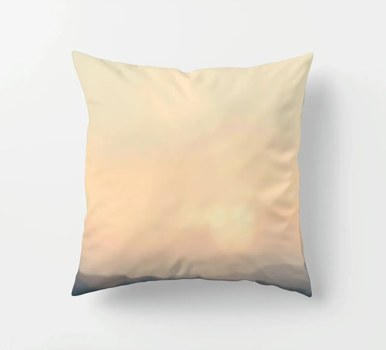 Sunset casting a warm glow over distant mountains and cloude decorative cushion by DesignDoodle