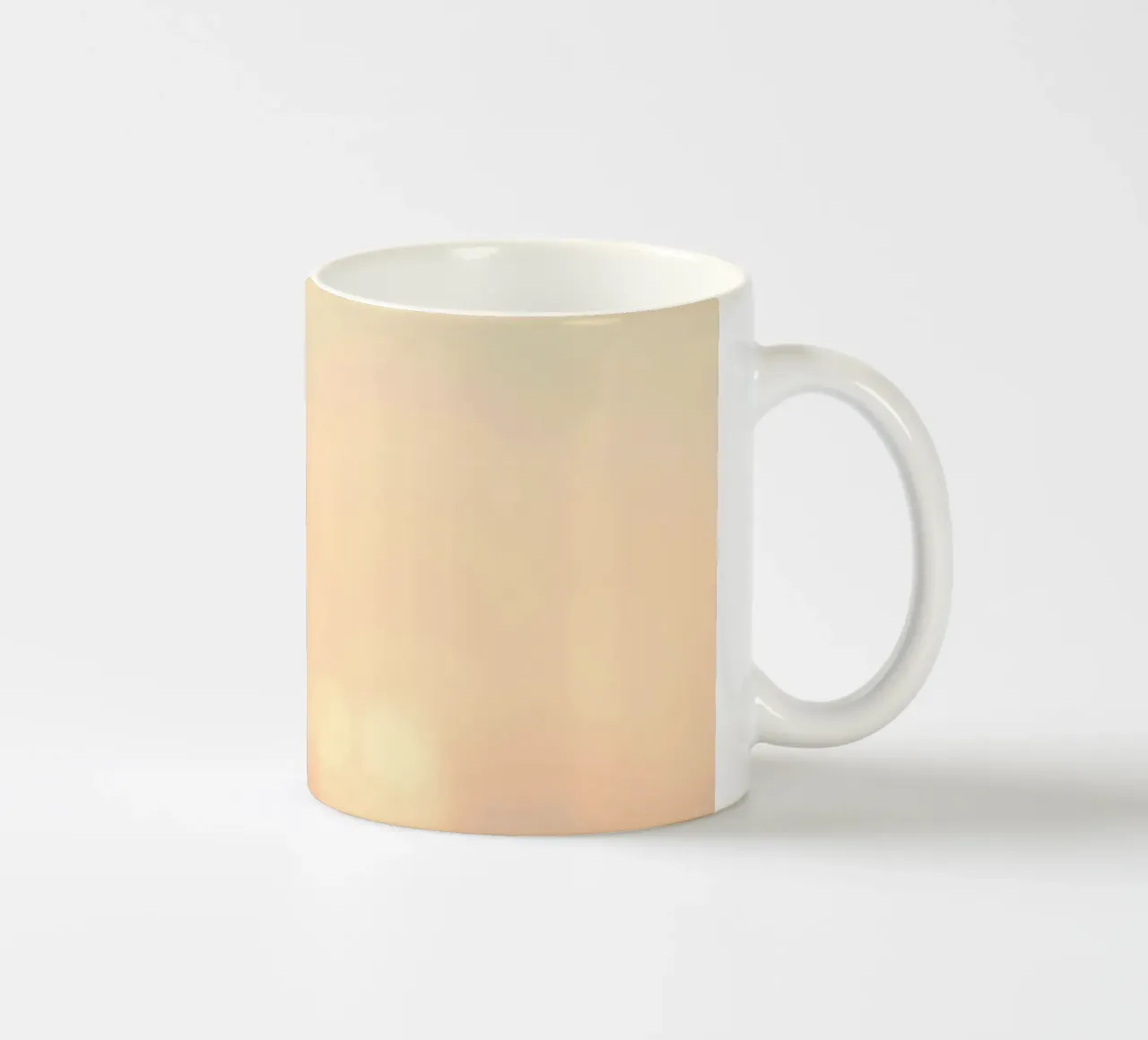 Sunset casting a warm glow over distant mountains and cloude ceramic mug by DesignDoodle