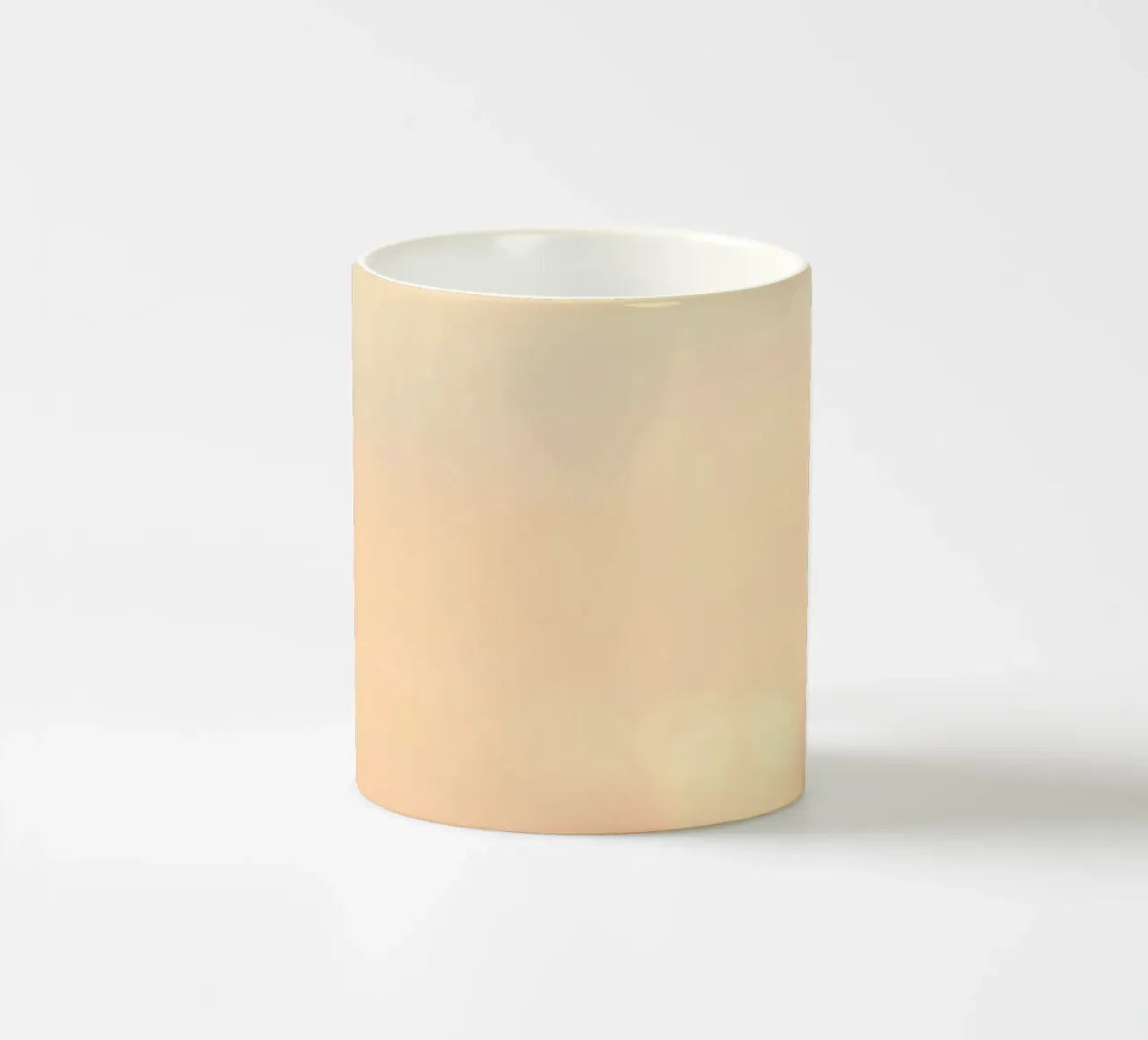 Sunset casting a warm glow over distant mountains and cloude ceramic mug by DesignDoodle