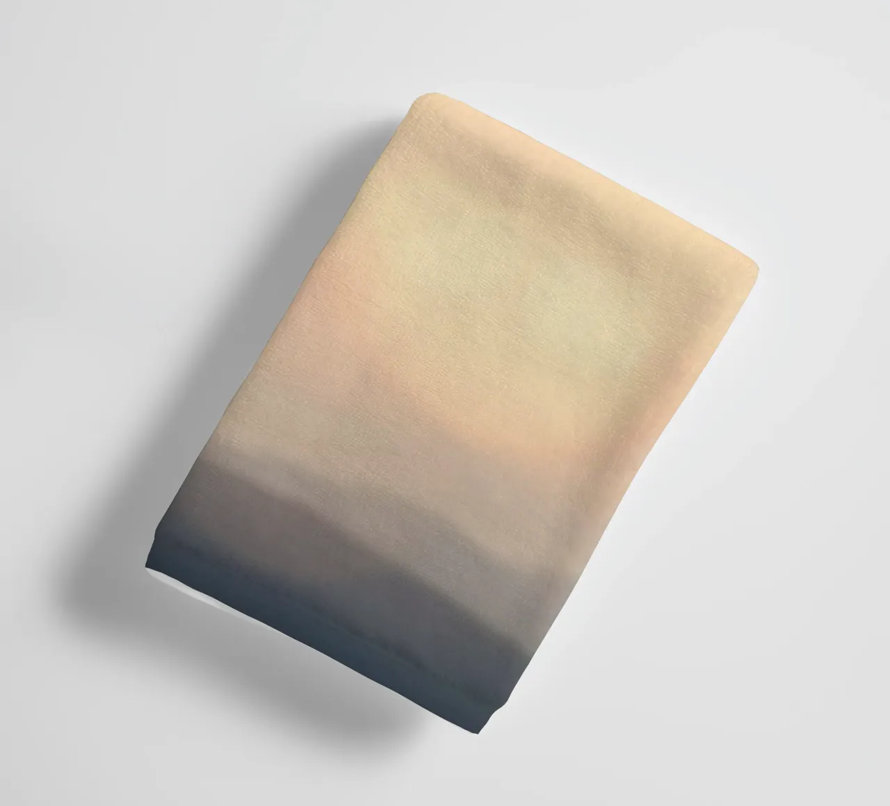Sunset casting a warm glow over distant mountains and cloude towel by DesignDoodle