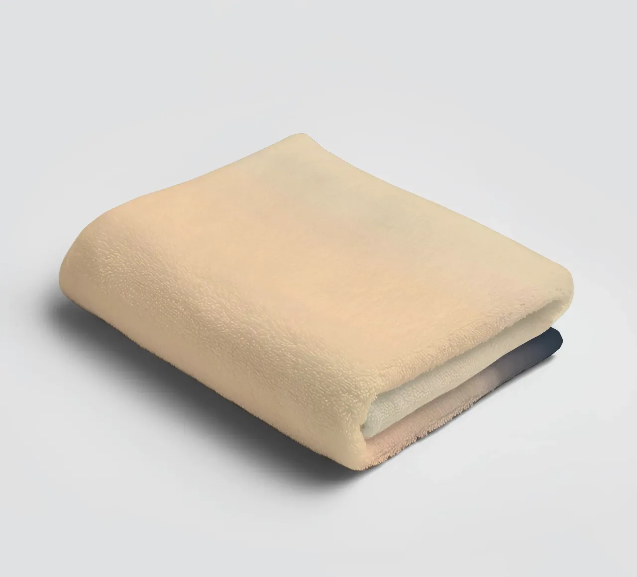 Sunset casting a warm glow over distant mountains and cloude towel by DesignDoodle