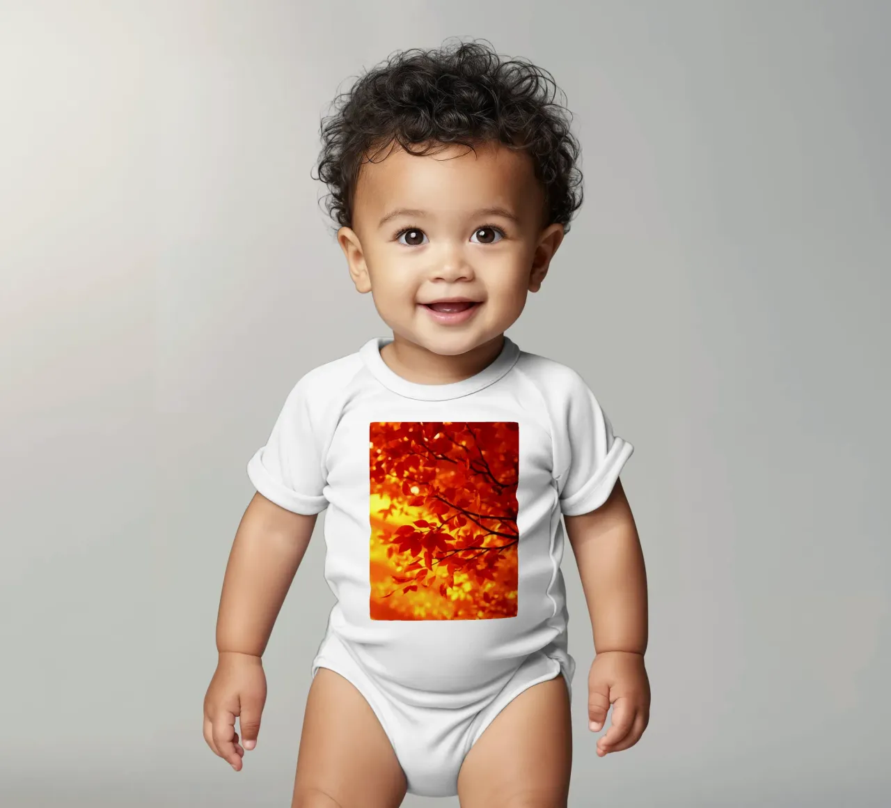 Vibrant autumn leaves illuminated against a warm background short-sleeve baby romper by DesignDoodle