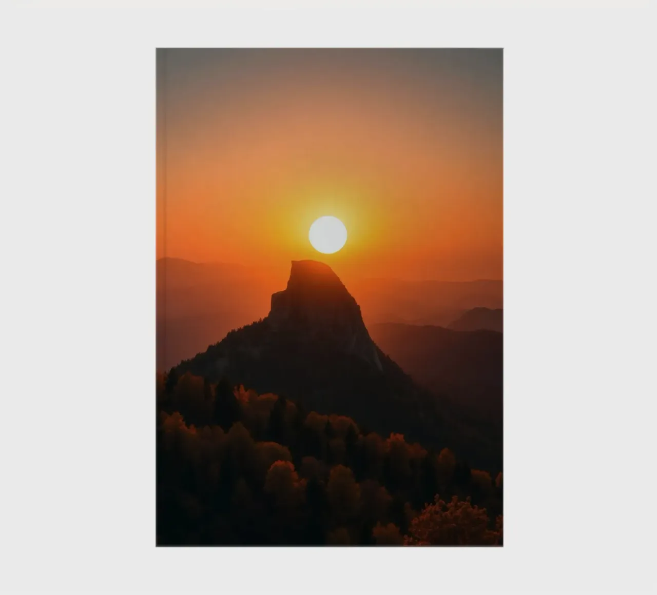 Sunset over a mountain peak with vibrant colors notebook by DesignDoodle