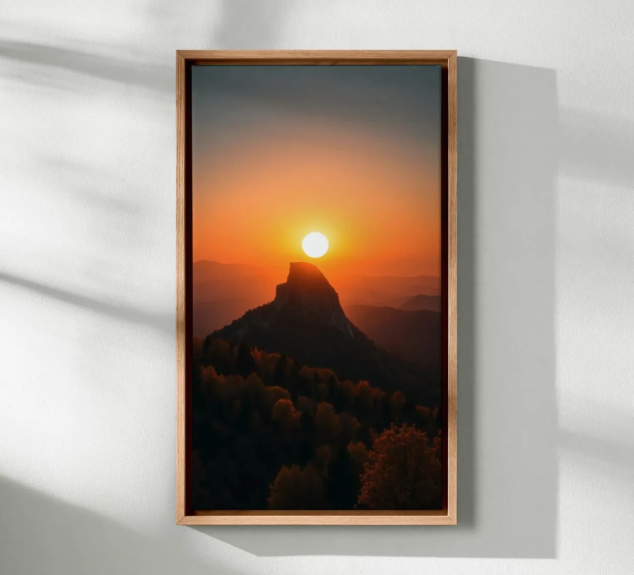 Sunset over a mountain peak with vibrant colors canvas with Floater frame by DesignDoodle
