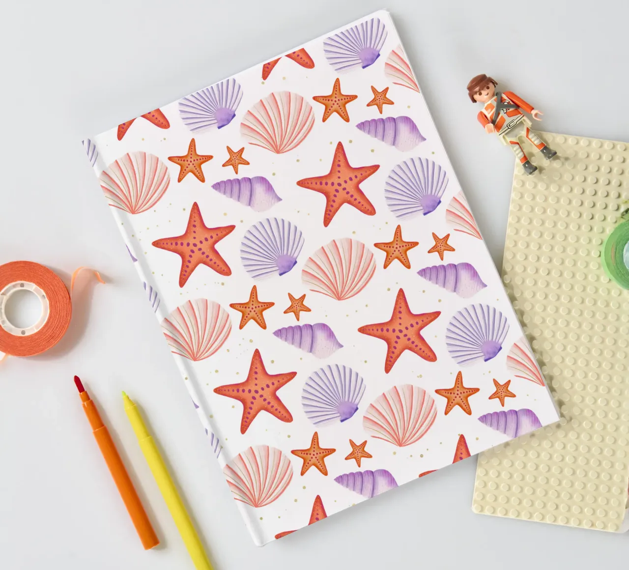 Starfish and shells. Maritime pattern in watercolour notebook by CalliLetters