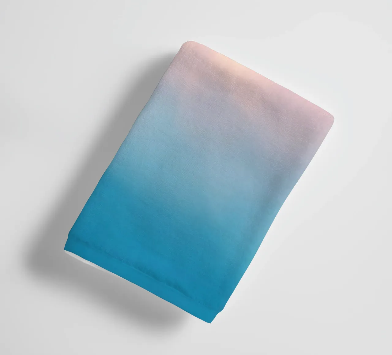 Soft pastel gradient background blending warm pinks and cool towel by DesignDoodle