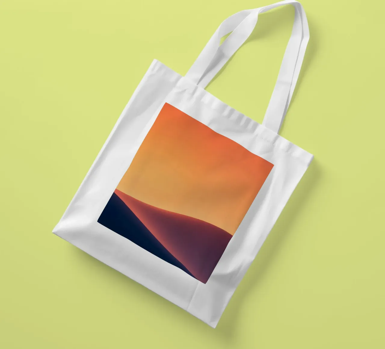 smooth hills under a gradient sunset sky with warm orange tote bag by DesignDoodle
