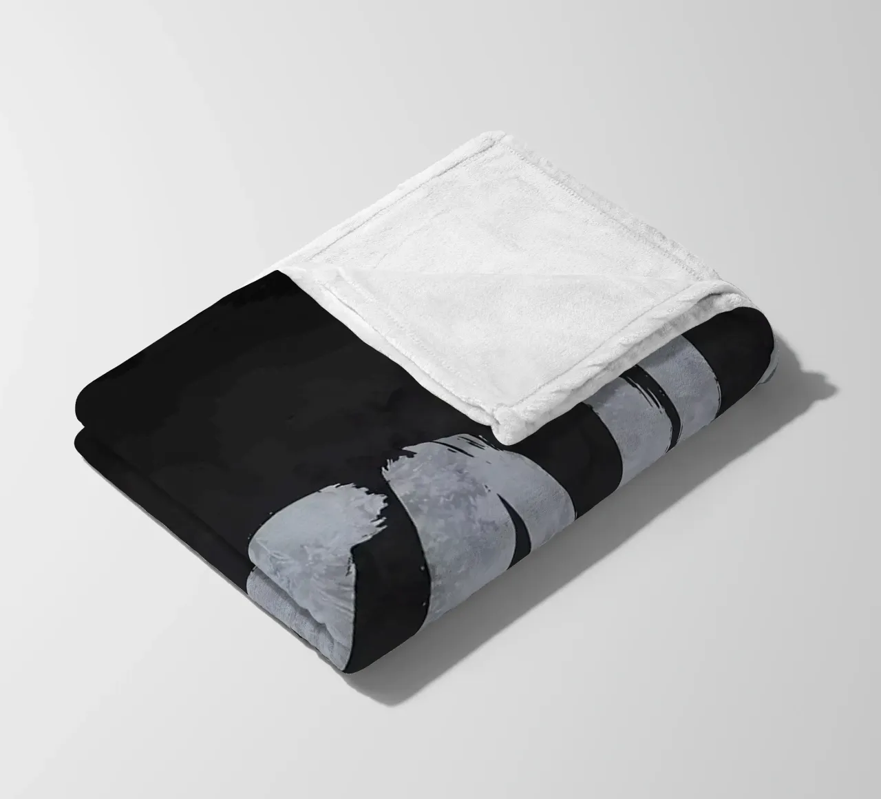 Grind fleece blanket by Delaplane