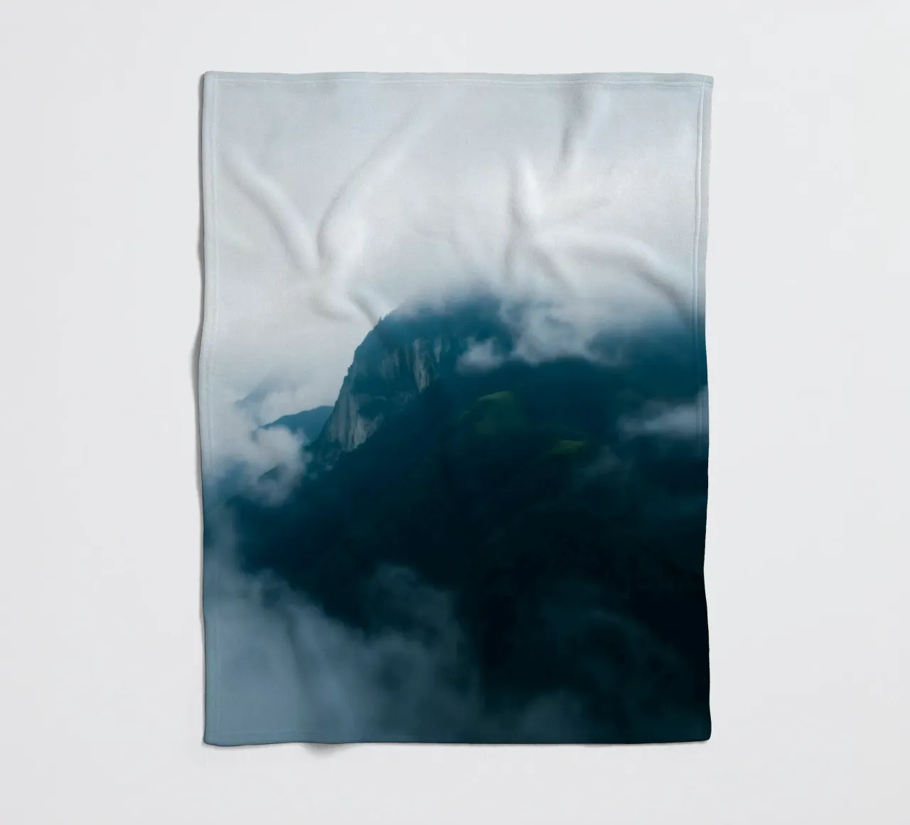Mystical mountain ranges shrouded in fog fleece blanket by DesignDoodle