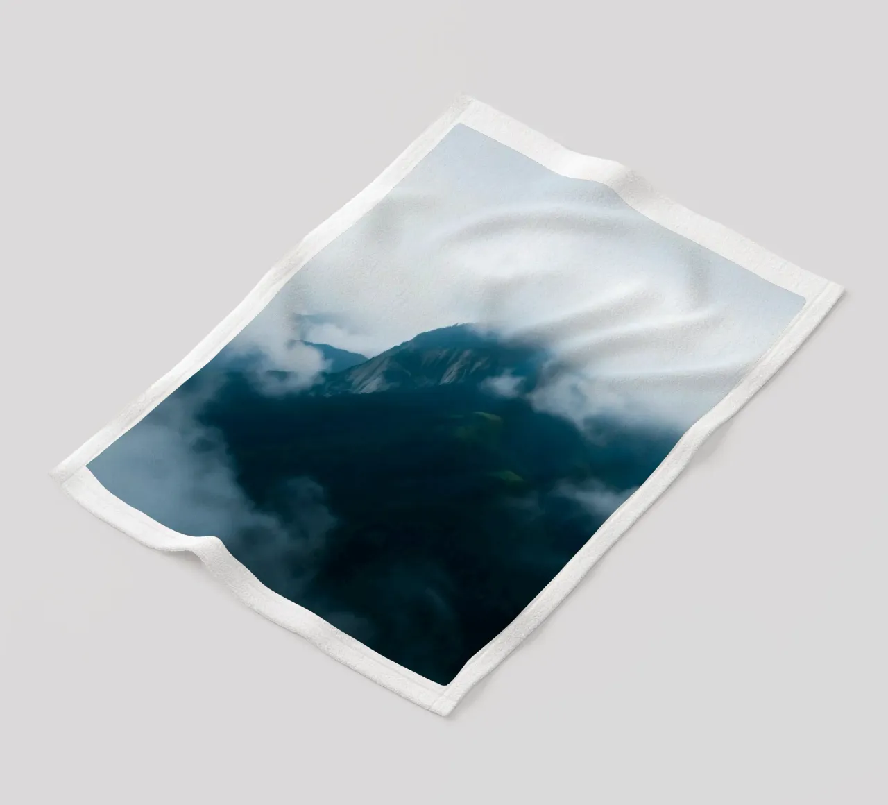 Mystical mountain ranges shrouded in fog fleece blanket by DesignDoodle
