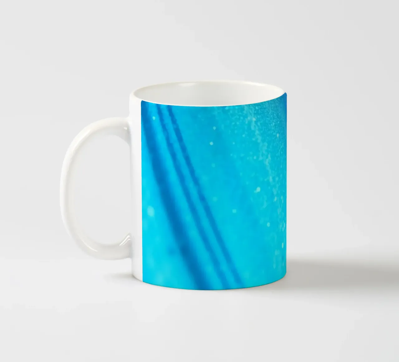 Vibrant abstract flowing blue waves and shimmering elements ceramic mug by DesignDoodle