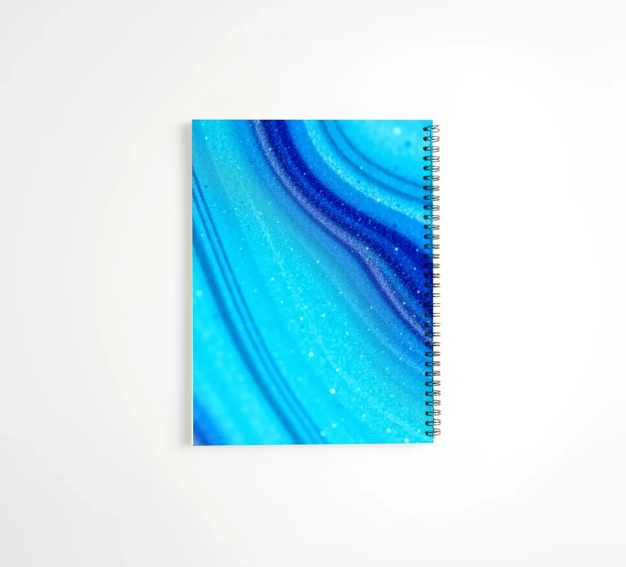 Vibrant abstract flowing blue waves and shimmering elements spiral notebook by DesignDoodle