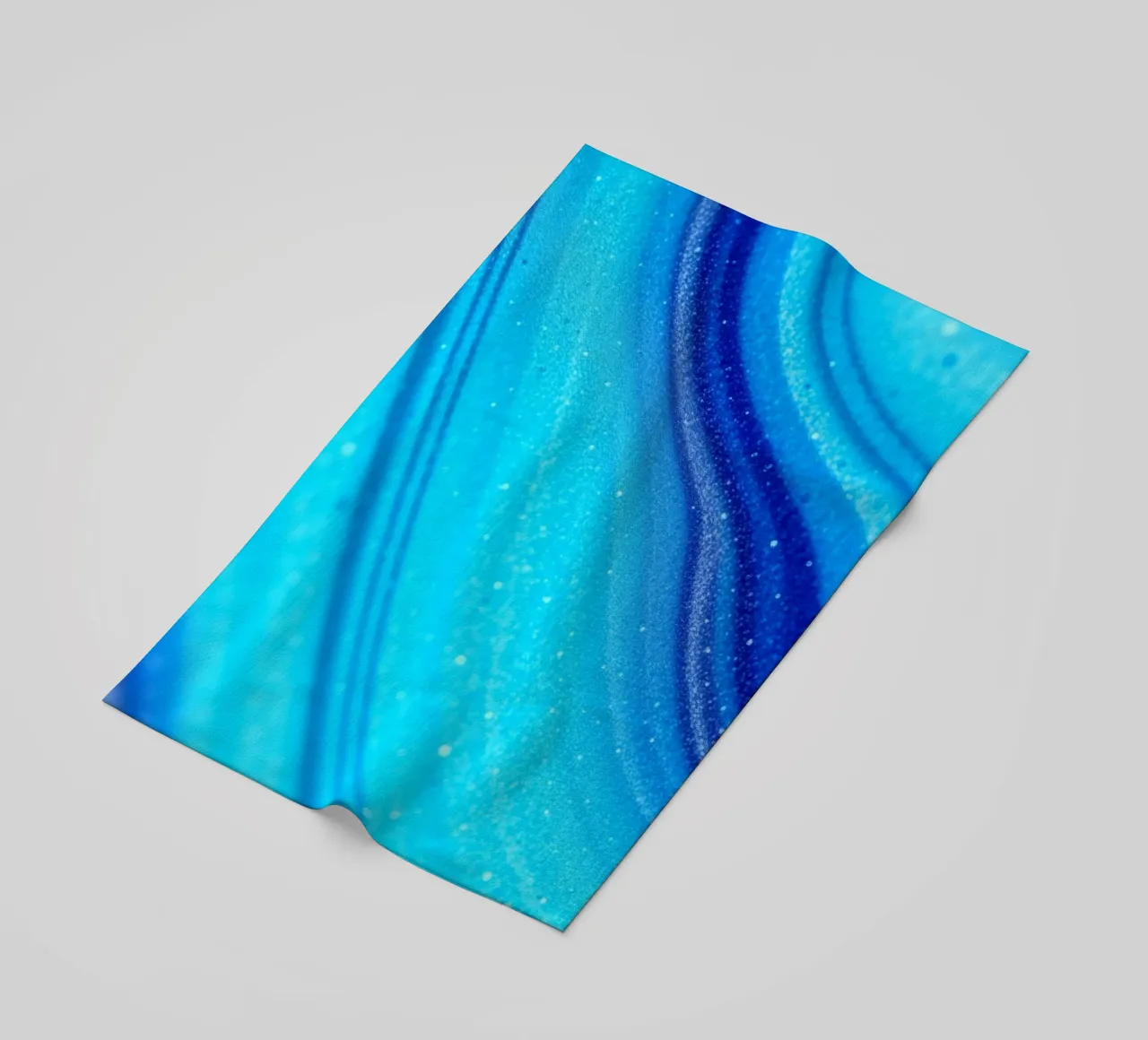 Vibrant abstract flowing blue waves and shimmering elements beach towel by DesignDoodle
