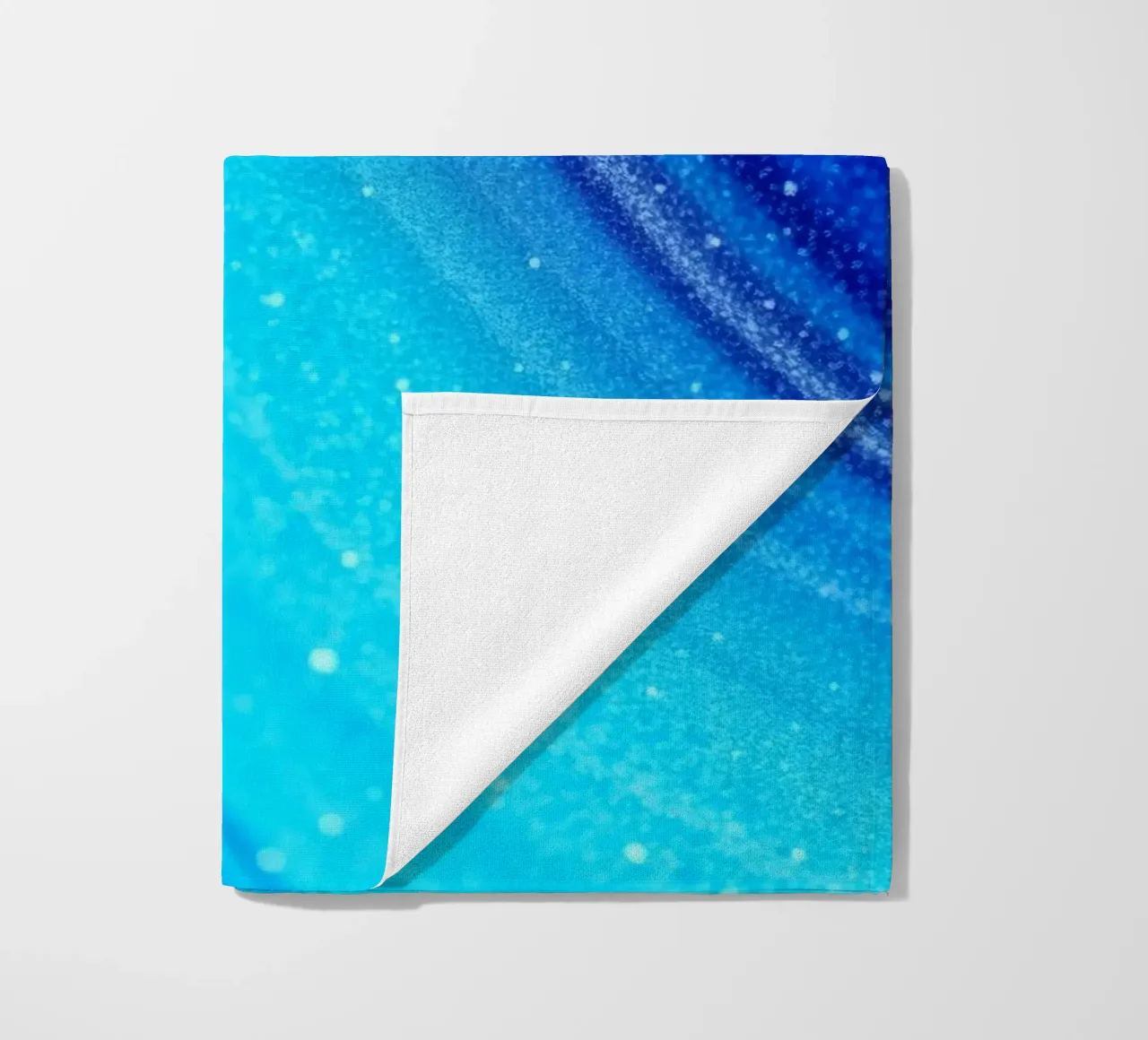 Vibrant abstract flowing blue waves and shimmering elements beach towel by DesignDoodle