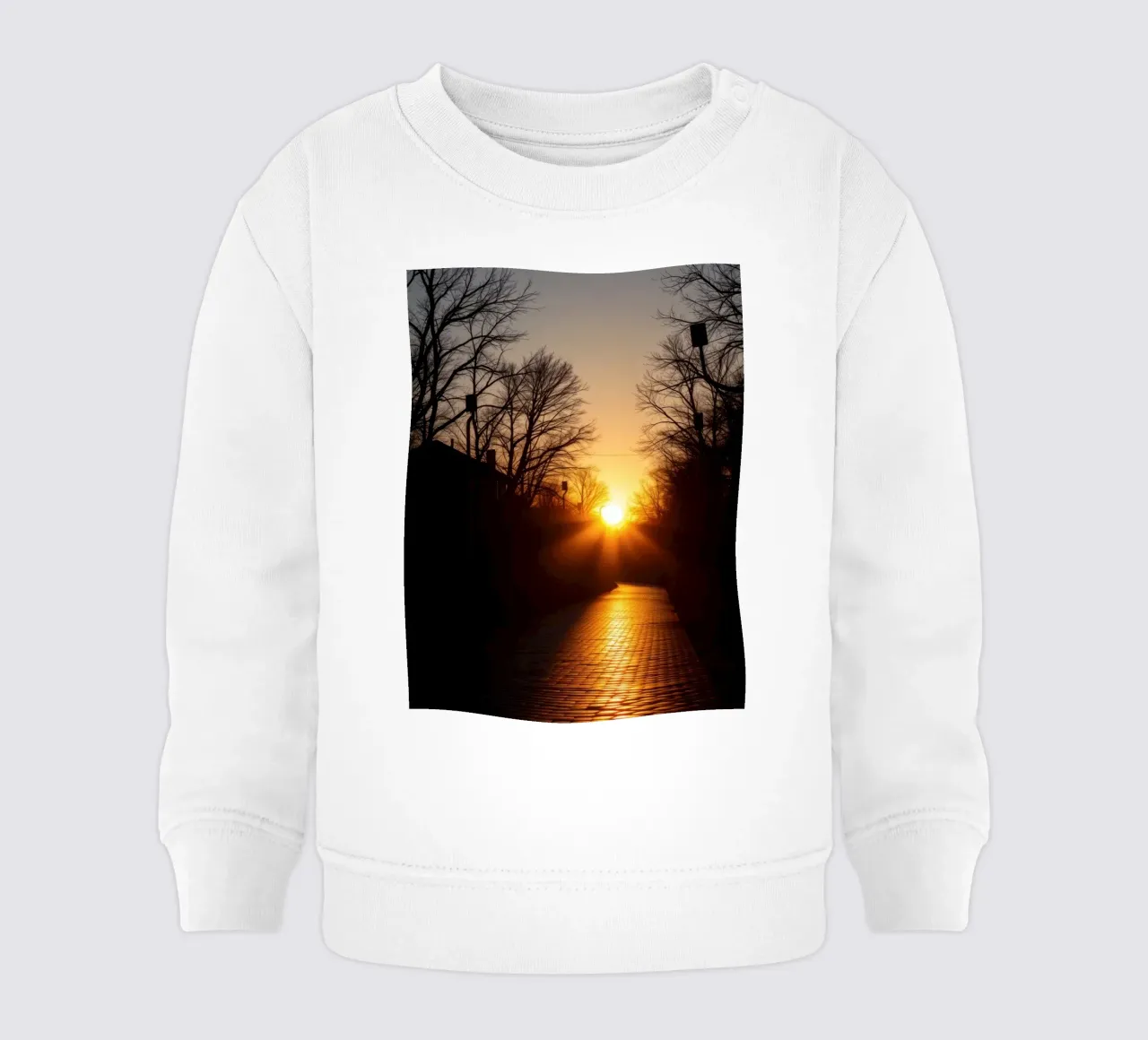 Sunset view along a tree-lined pathway with warm hues baby sweatshirt by DesignDoodle
