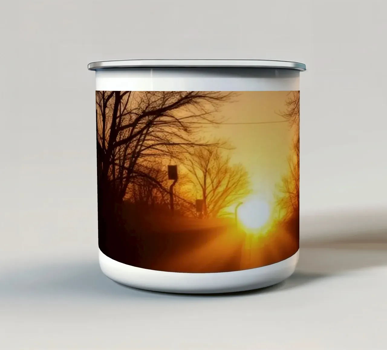 Sunset view along a tree-lined pathway with warm hues enamel mug by DesignDoodle
