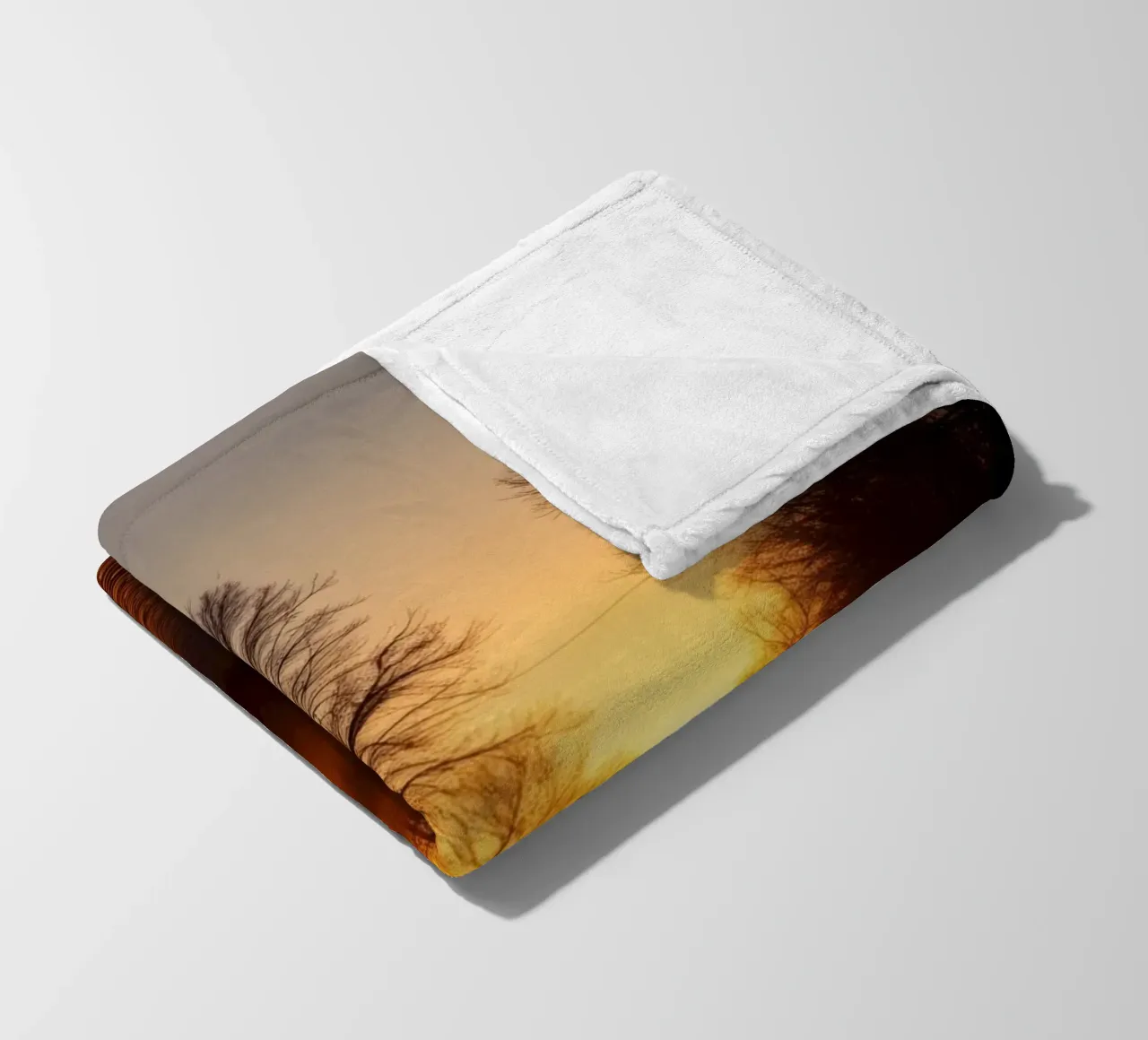 Sunset view along a tree-lined pathway with warm hues fleece blanket by DesignDoodle