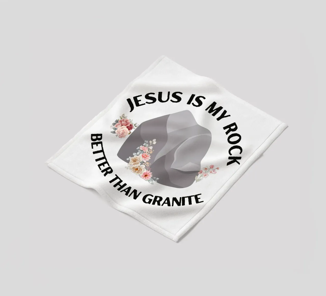Rocks may be tough, but cannot compare to strength of Jesus fleece blanket by Lionandlamb