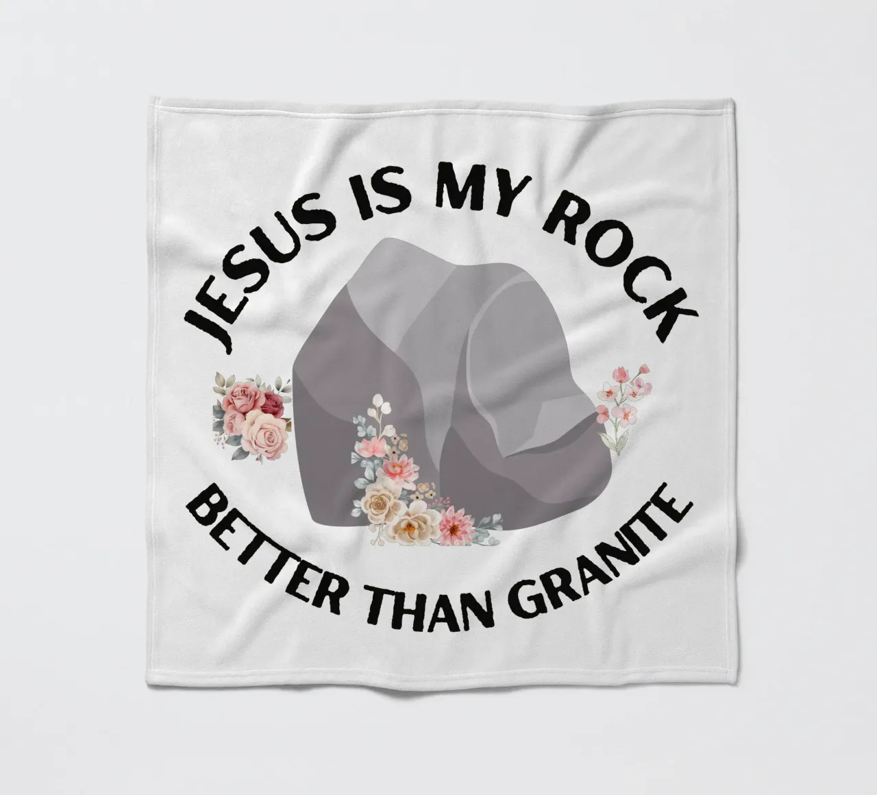 Rocks may be tough, but cannot compare to strength of Jesus fleece blanket by Lionandlamb