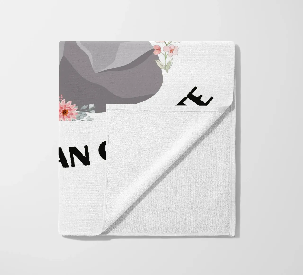 Rocks may be tough, but cannot compare to strength of Jesus beach towel by Lionandlamb