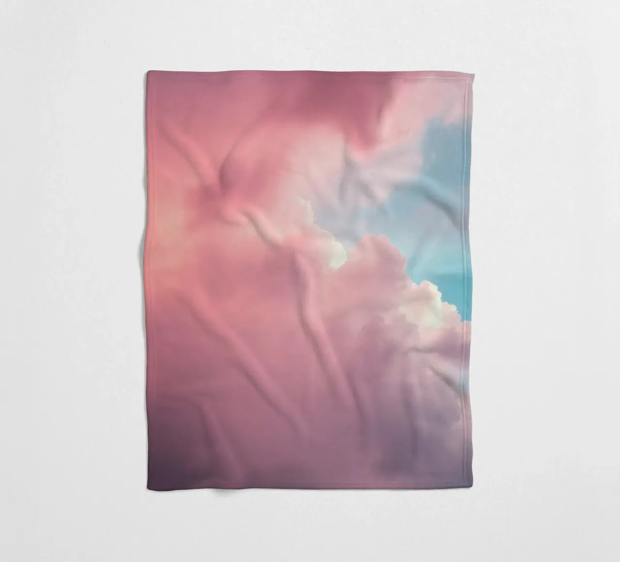 Vibrant cloud formations create a stunning abstract fleece blanket by DesignDoodle