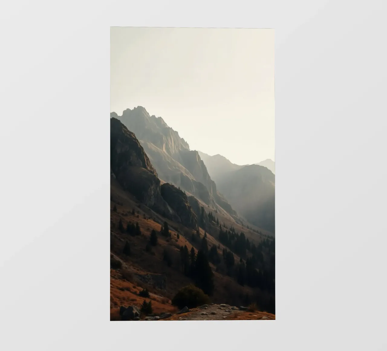 Majestätischer Bergblick mit nebligen Gipfeln im sanften Sonnenlicht PVC Plane von DesignDoodle