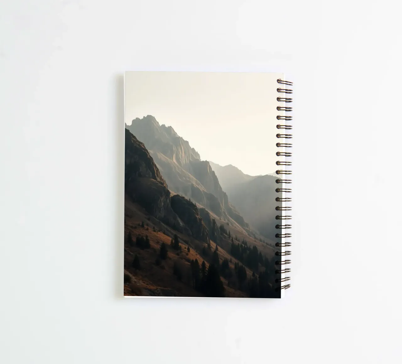 Majestic mountain view with misty peaks under soft sunlight spiral notebook by DesignDoodle