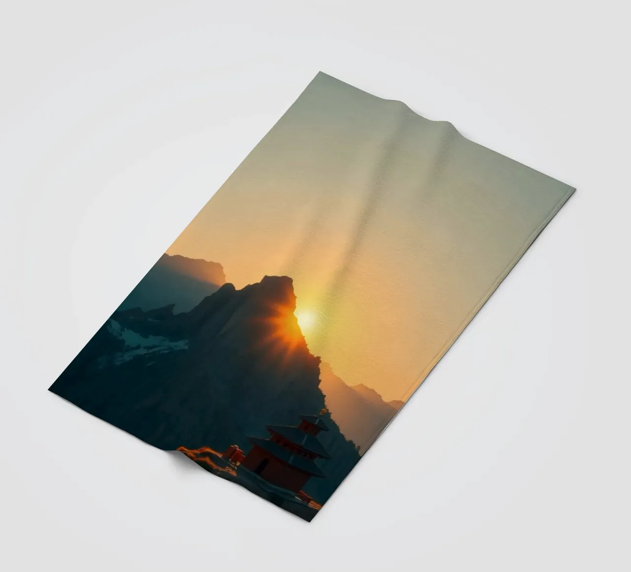 Sunset view over mountains with traditional structure fleece blanket by DesignDoodle