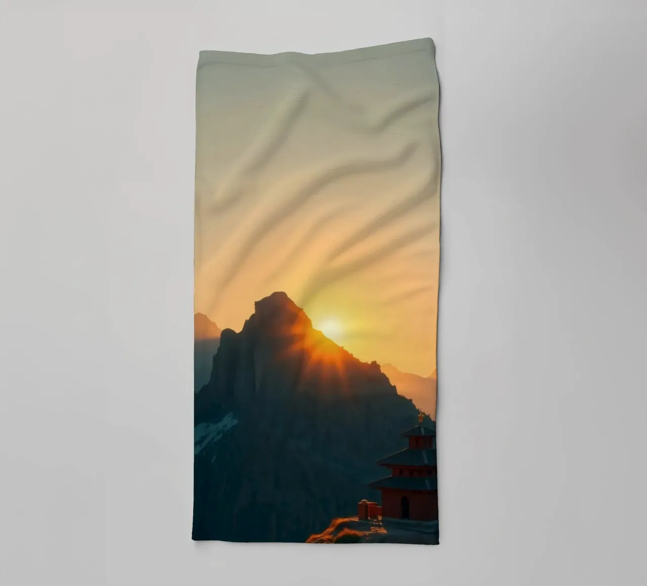 Sunset view over mountains with traditional structure towel by DesignDoodle