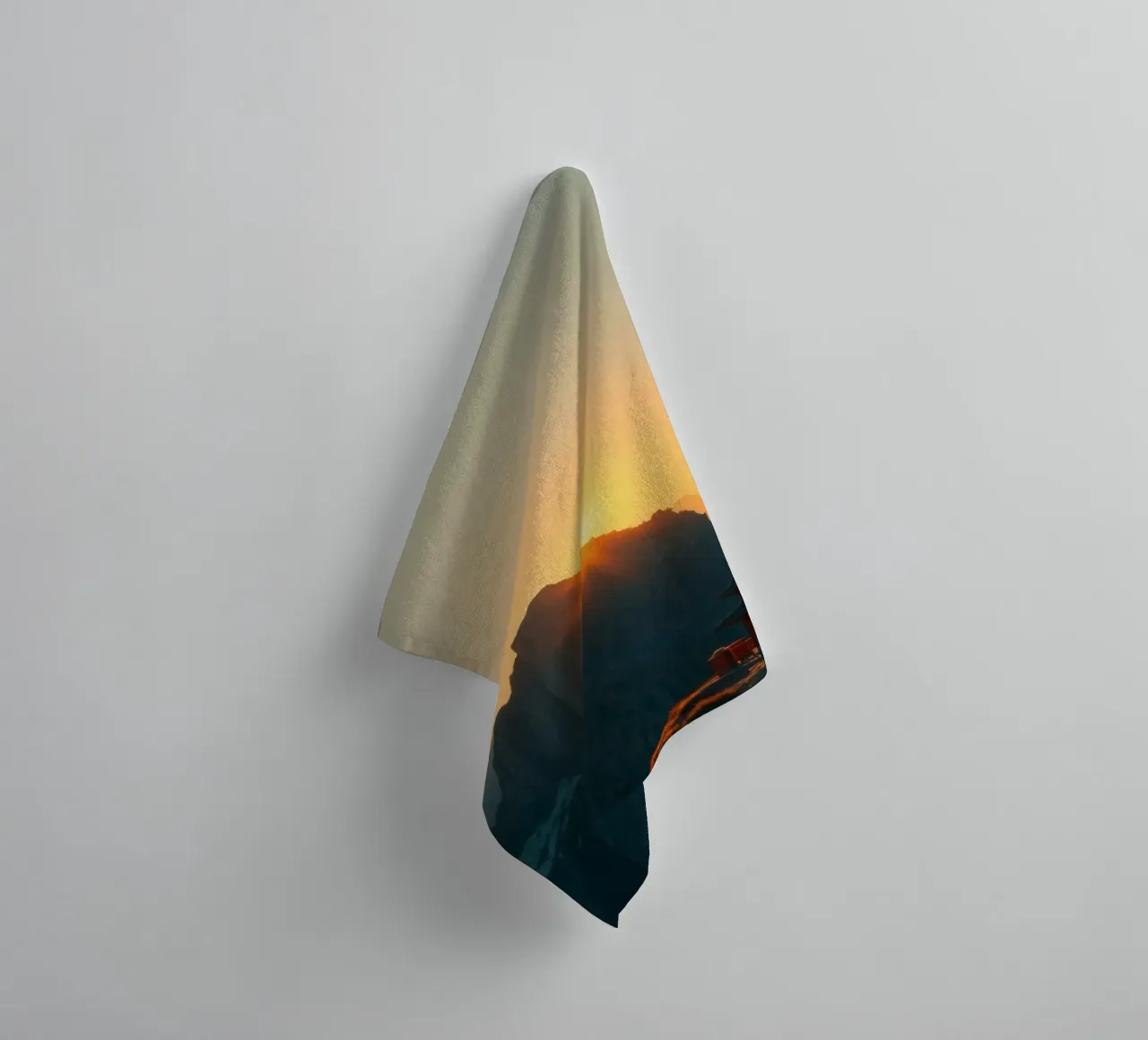 Sunset view over mountains with traditional structure towel by DesignDoodle