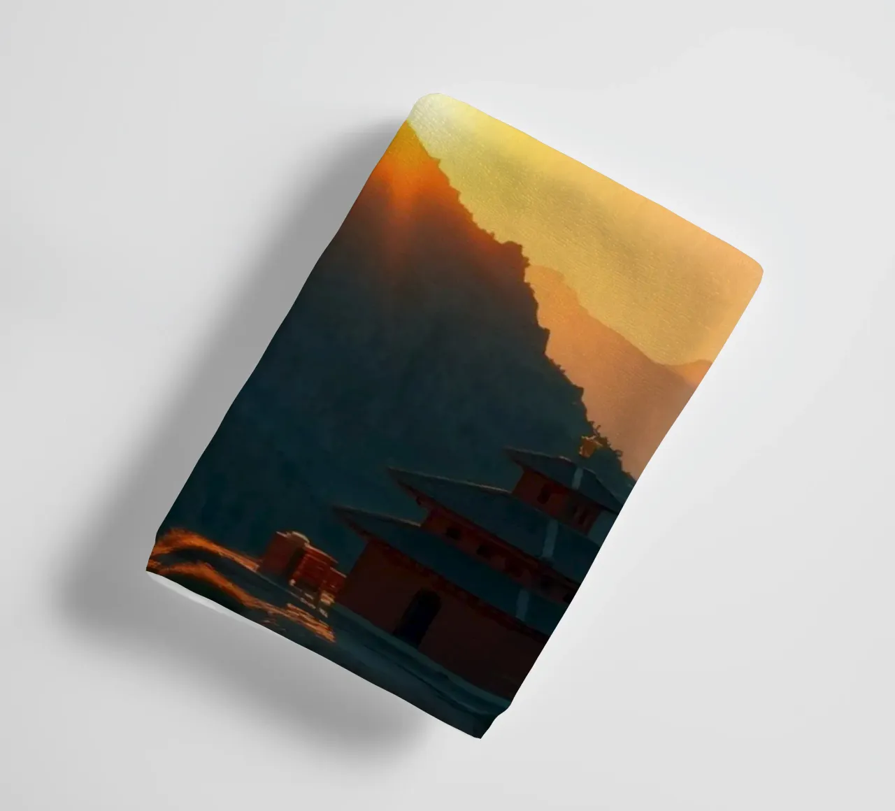 Sunset view over mountains with traditional structure towel by DesignDoodle